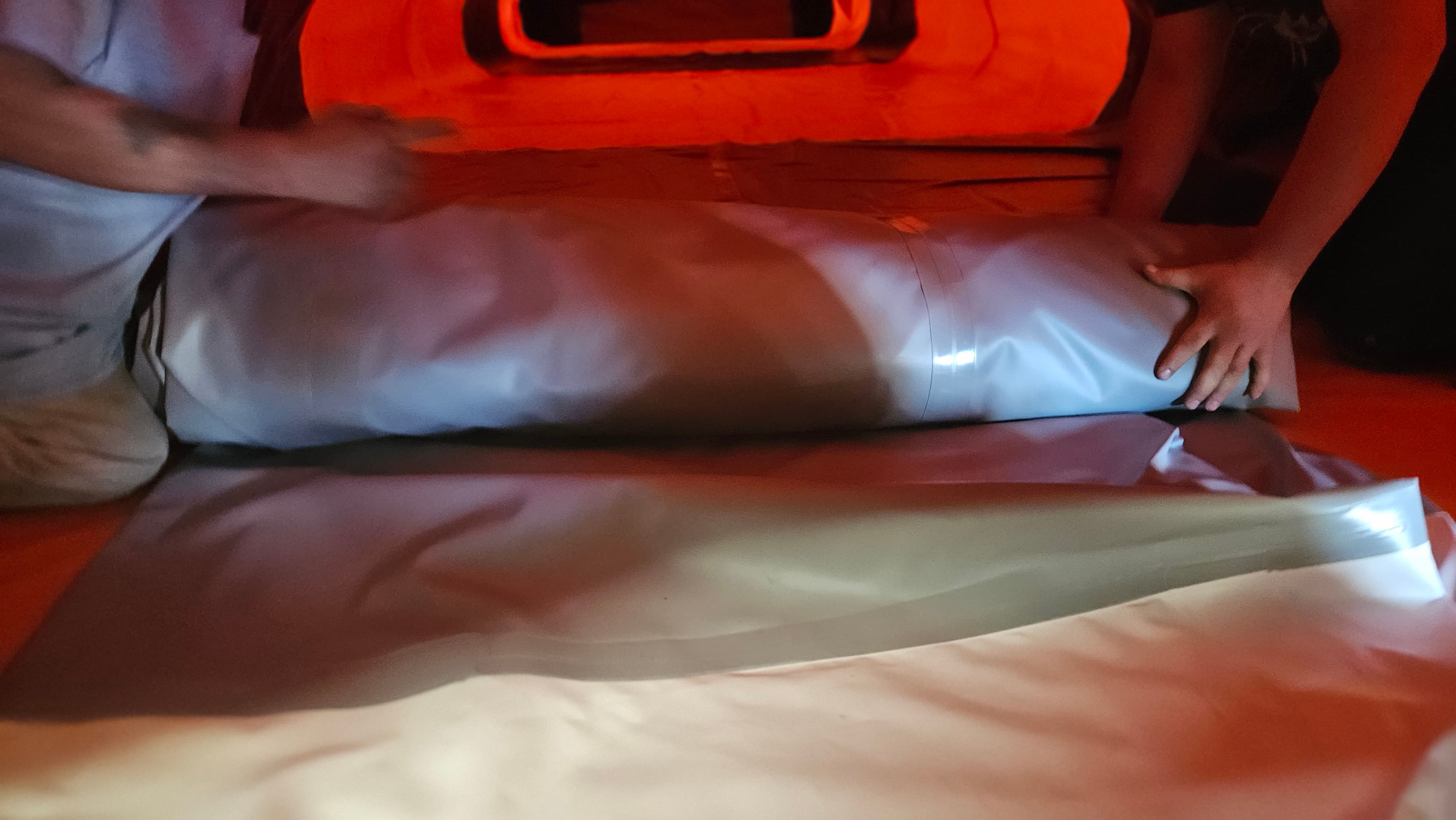Smooth the roll during Water Blob bladder installation